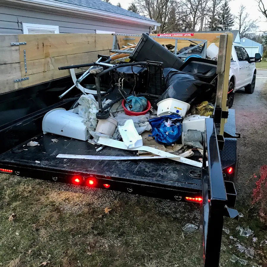 Roll-off dumpster delivered to a residential driveway in Selmer